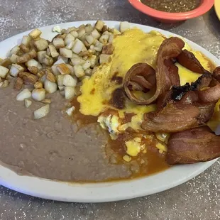 Huevos Rancheros with side of bacon