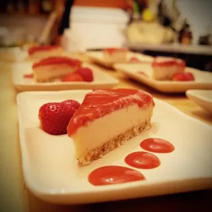 Raw, vegan cheesecake with strawberry topping.
