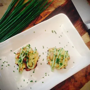 Smashed Potato Cake appetizers with Avocado Aioli and Chives