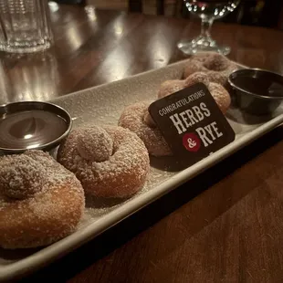 Donuts with chocolate and Carmel sauce/ best caramel I've ever had