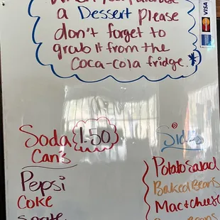 a white board with a list of food items on it