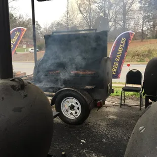 smoke coming out of the grill