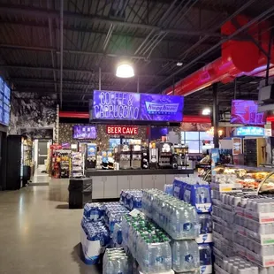 shelves of bottled water in a grocery store