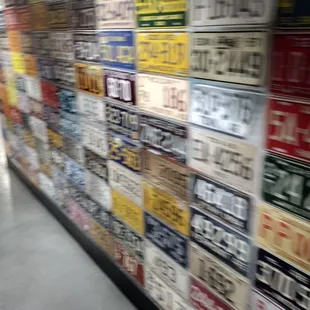 a man pushing a shopping cart in a grocery store