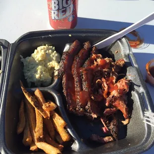 Brisket, pulled pork, potato salad and fries. And what bbq is complete without a Big Red?! Fantastic place. Best brisket in the Basin.