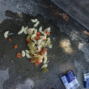 a pile of food left on the ground
