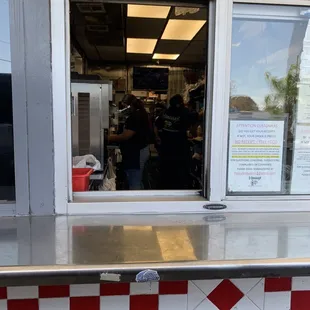 Drive-through window... Read sign
