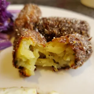 You can see the inside was a fresh grated creamy seasoned potato and the outside was a crunchy sweet blue corn layer. Very good.