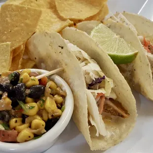 Pulled Pork Tacos with black bean corn relish and homemade tortilla chips