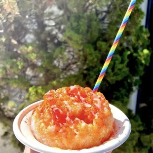 a person holding a plate of food