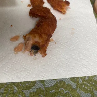 a piece of fried chicken on a napkin