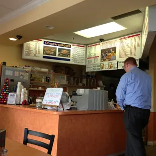 a man standing at the counter