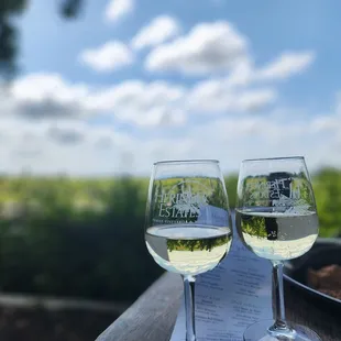 two glasses of wine on a table