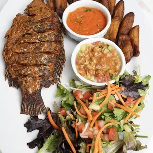 Grill talapia with salad and plantains