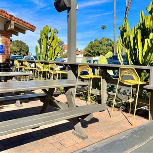 Counter top seating facing out to the street. San Juan Capistrano Mission is across the street.