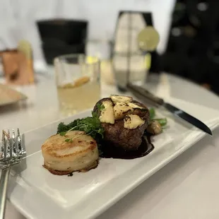 7oz Filet with bleu cheese and a port wine reduction with au gratin potatoes and broccolini.
