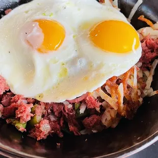 a fried egg and hash browns
