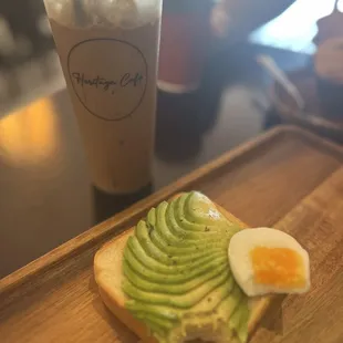 Avocado toast, Vietnamese coffee, blueberry muffin and white chocolate mocha