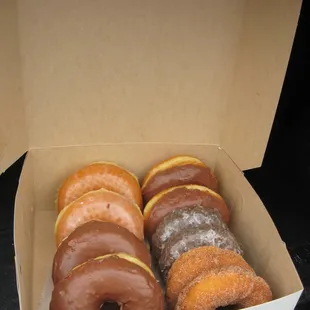 a dozen donuts in a box