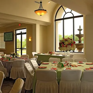 The large arched window nook is the perfect area to place a bride &amp; groom table.