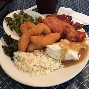 BBQ chicken, rice, greens, green beans, mashed potatoes, hush puppies