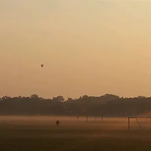 Early morning, fog was just lifting and hot air balloon in the back ground had just passed over.