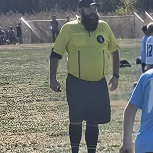 This ref could see past his stomach or facial hair. He was color blind and apparently has only refed pony league soccer before division 1.