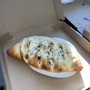 a pizza in a pizza box
