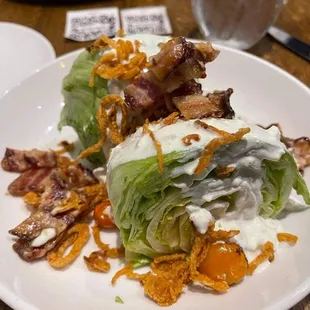 The Wedge Salad with hidden freshly ground pepper underneath!