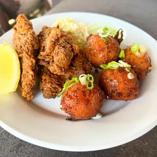 Fried Chesapeake blue catfish, zucchini hushpuppies, cilantro buttermilk sauce, coleslaw, lemons.