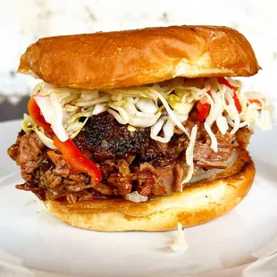 Chipped brisket with Fresno Chile BBQ, onions &amp; vinegar slaw
