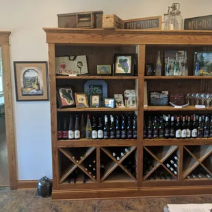 a wine rack with bottles of wine