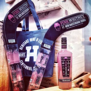 a bottle of pink wine and a bottle of vodka