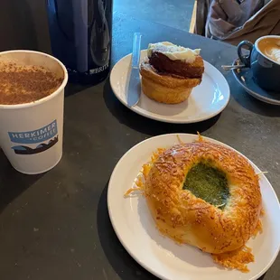 Pesto cheese bread, cinnamon roll, latte, mocha