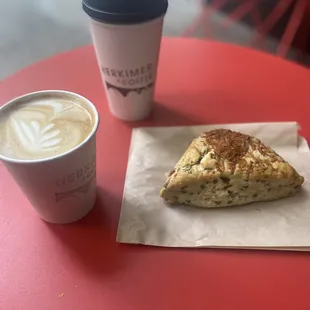 Oatmilk latte, drip coffee and dill scone.