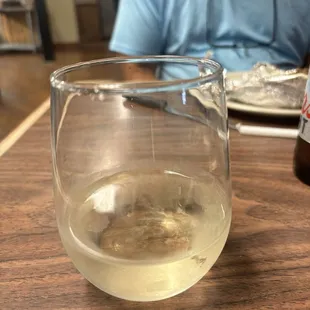 This is the glass of $8 I got and after eating by 1/2 of my meal. Will not. One back