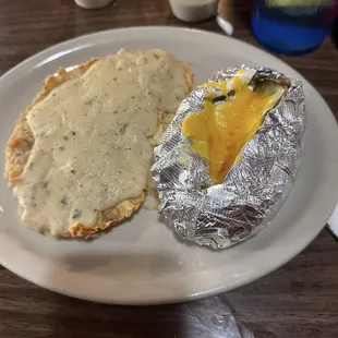 Chicken fried steak with baked potato