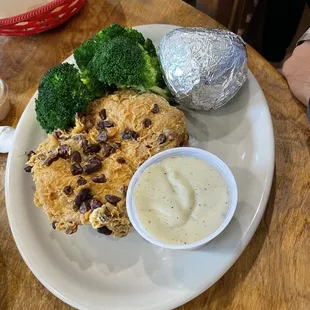 Peacan crusted chicken fried chicken, baked potato, broccoli