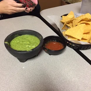 Guacamole dip starts creamy and then has some heat.