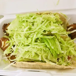 2 fish tacos  Lettuce galore