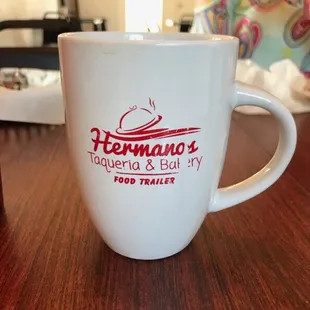 a coffee cup on a table