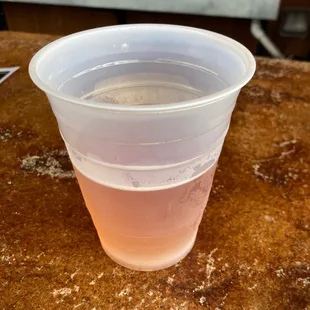 a plastic cup filled with liquid