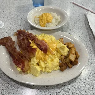 Grits eggs bacon potatoes
