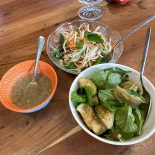 Pickled eggplant, papaya salad, vinegar pepper sauce