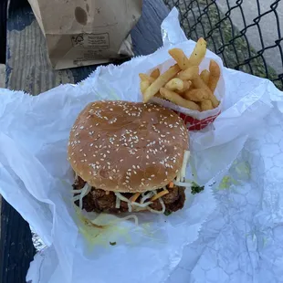 Cambodian Fried Chicken Sandwich wit French fries