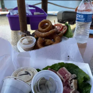 Seared ahi tuna, onion rings and a blackened grouper sandwich(can't really see it though)