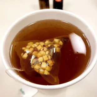 Peach Blossom tea w/ honey (and my own essential oils to help me kick this cold!). Good stuff!