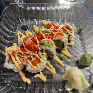 Crazy Monkey Roll Spicy tuna, salmon, jalapeno and cucumber, topped with masago, kaiware, spicy mayo and Sriracha.