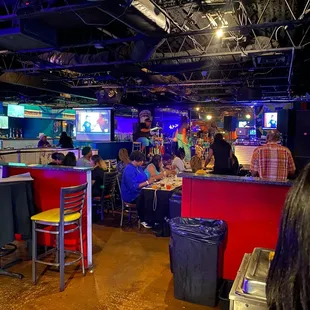 people sitting at the bar