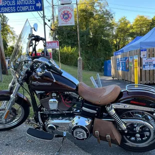 a motorcycle parked on the side of the road